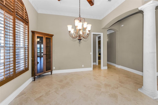 9933 Milano Dr, Trinity, FL 34655 - unfurnished room with arched walkways, ornate columns, a chandelier, and baseboards