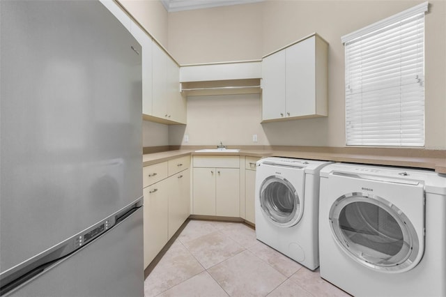 9933 Milano Dr, Trinity, FL 34655 - washroom featuring washing machine and dryer, light tile patterned floors, crown molding, and cabinet space