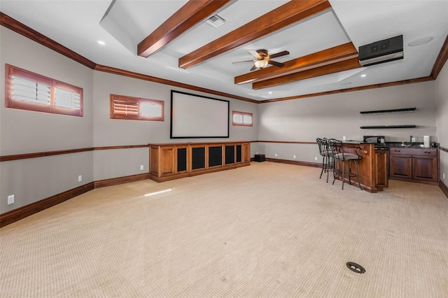 9933 Milano Dr, Trinity, FL 34655 - home theater room with crown molding, light carpet, beamed ceiling, wet bar, and baseboards