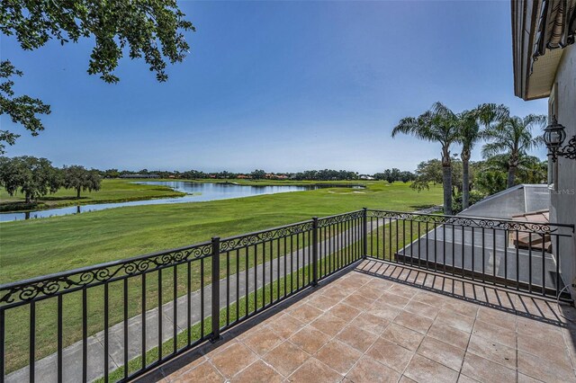 9933 Milano Dr, Trinity, FL 34655 - view of patio / terrace featuring a water view, view of golf course, and a balcony