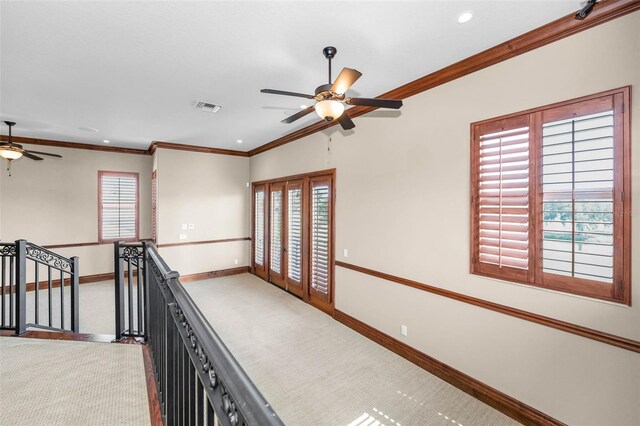 9933 Milano Dr, Trinity, FL 34655 - hallway featuring carpet floors, an upstairs landing, baseboards, crown molding, and recessed lighting