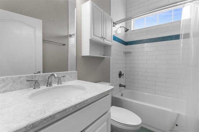 full bath with toilet, shower / bathtub combination, and vanity