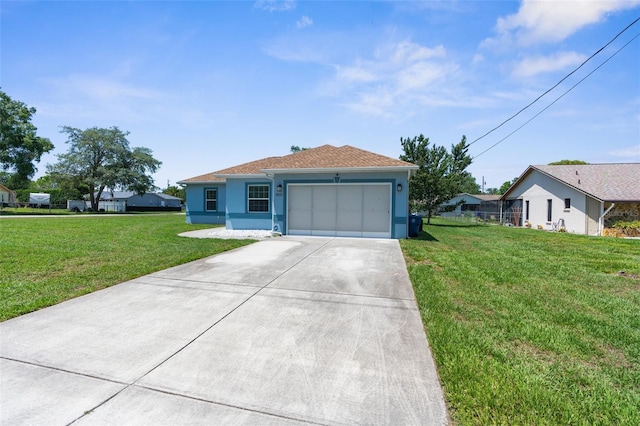 ranch-style home featuring an attached garage, a front yard, concrete driveway, and stucco siding