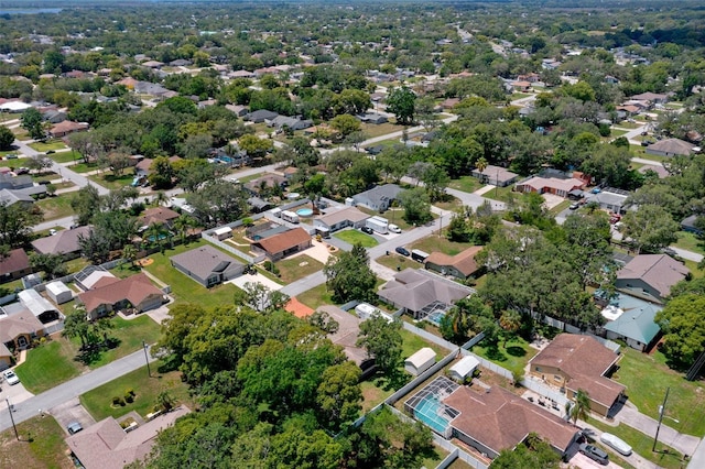 aerial view of property's location featuring nearby suburban area
