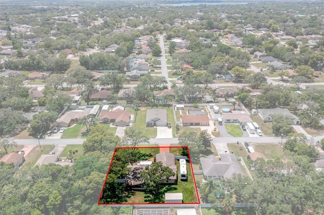 aerial view of residential area with property boundaries highlighted