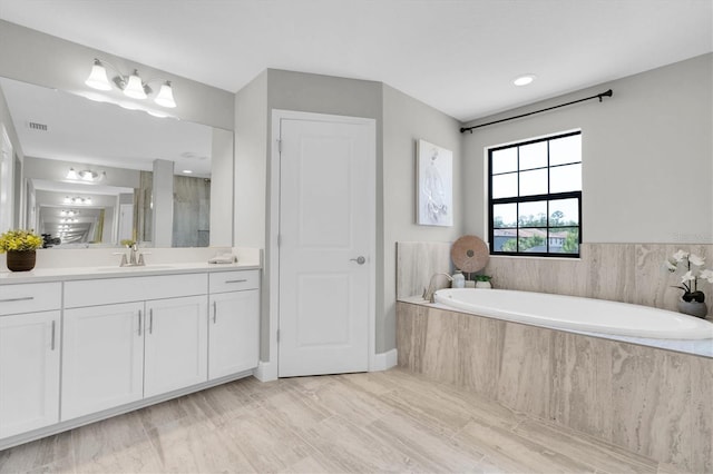 3767 Dragonfly Trl, Odessa, FL 33556 - full bath with a bath, vanity, and a stall shower