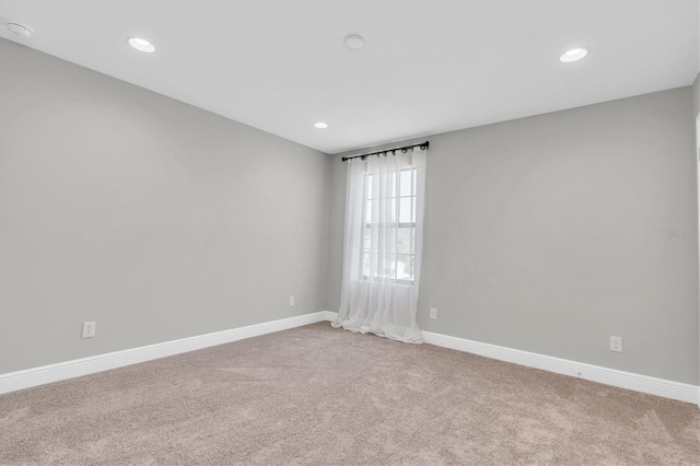 3767 Dragonfly Trl, Odessa, FL 33556 - carpeted spare room with baseboards and recessed lighting