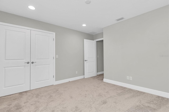3767 Dragonfly Trl, Odessa, FL 33556 - unfurnished bedroom featuring carpet floors, baseboards, a closet, and recessed lighting