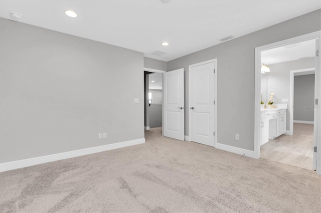 3767 Dragonfly Trl, Odessa, FL 33556 - unfurnished bedroom featuring light carpet, baseboards, and recessed lighting