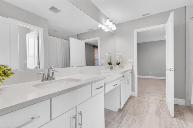 3767 Dragonfly Trl, Odessa, FL 33556 - full bathroom featuring vanity and baseboards
