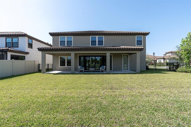3767 Dragonfly Trl, Odessa, FL 33556 - back of house featuring a patio, stucco siding, and a tiled roof