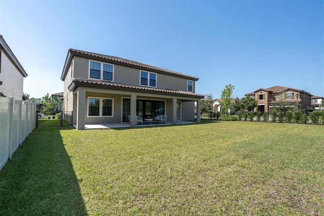 3767 Dragonfly Trl, Odessa, FL 33556 - rear view of property featuring stucco siding, a patio, and a tiled roof
