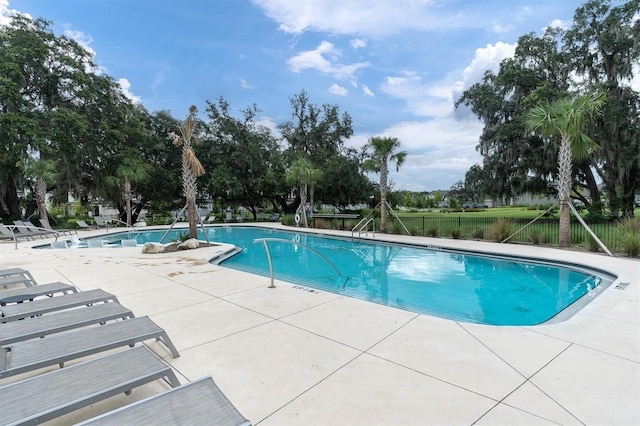 3767 Dragonfly Trl, Odessa, FL 33556 - community pool featuring a patio area and fence