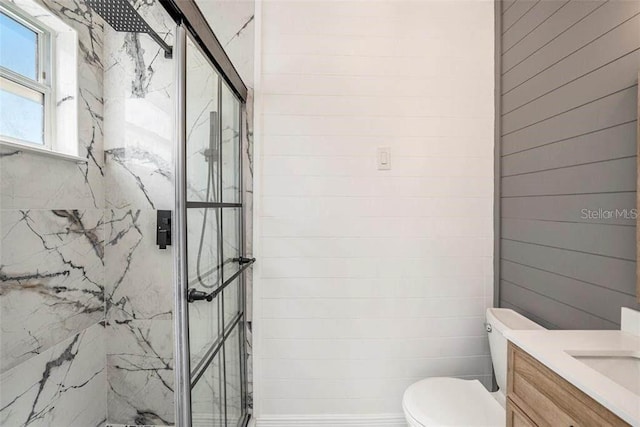 6989 300 Th Ave N, Clearwater, FL 33761 - full bathroom featuring a marble finish shower, toilet, and vanity