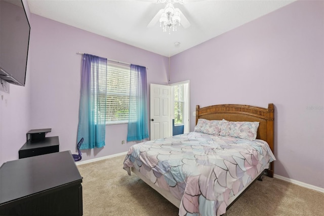 bedroom with carpet and baseboards