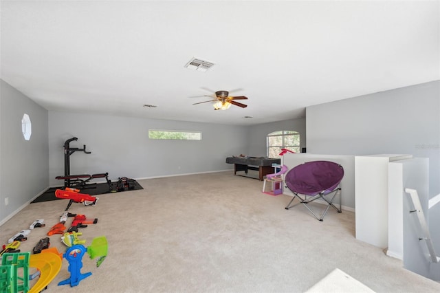 rec room featuring plenty of natural light, carpet flooring, ceiling fan, and baseboards