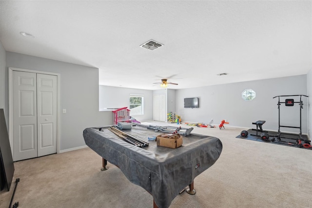 rec room with carpet floors, ceiling fan, baseboards, and billiards table