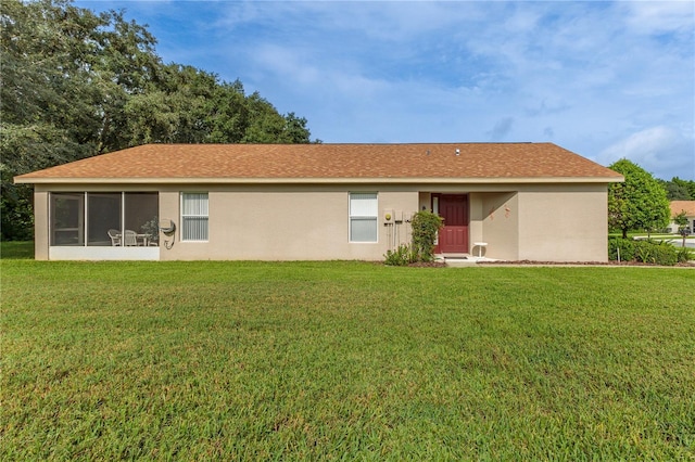 11158 Heathrow Ave, Spring Hill, FL 34609 - rear view of house featuring a lawn and stucco siding