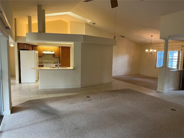 10054 Hernando Ridge Rd, Weeki Wachee, FL 34613 - unfurnished living room featuring light tile patterned floors, ceiling fan, a chandelier, light carpet, and high vaulted ceiling