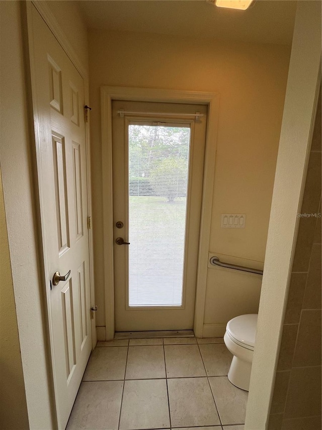 10054 Hernando Ridge Rd, Weeki Wachee, FL 34613 - bathroom featuring tile patterned flooring and toilet