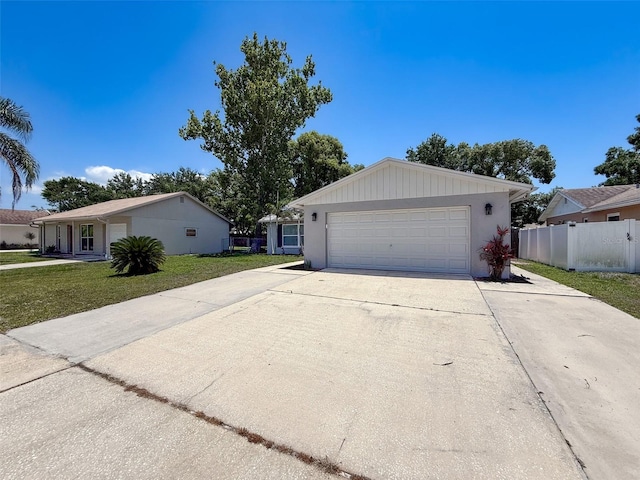 view of front of property featuring driveway and a garage