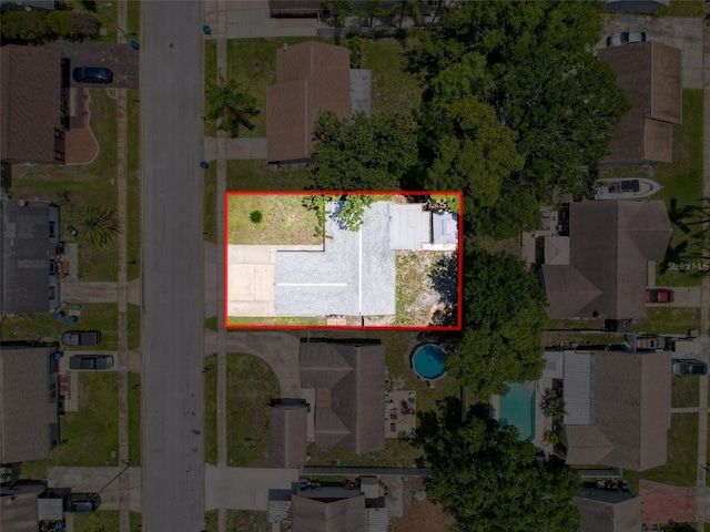 view of property location featuring a pool and property parcel outlined