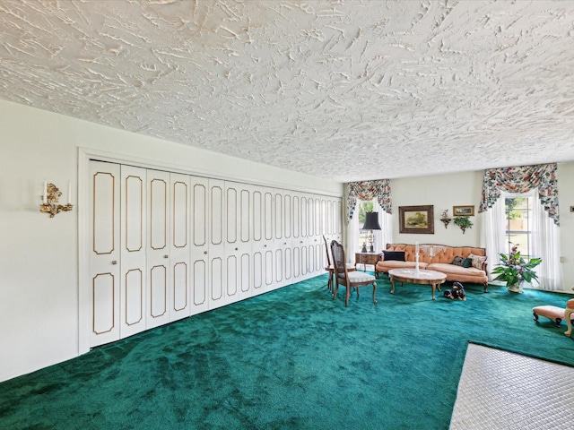 6823 Oak Hill Dr, New Port Richey, FL 34653 - carpeted living area with a textured ceiling