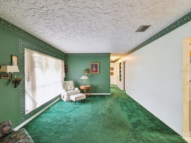 6823 Oak Hill Dr, New Port Richey, FL 34653 - unfurnished room with carpet flooring, baseboards, a textured ceiling, and crown molding