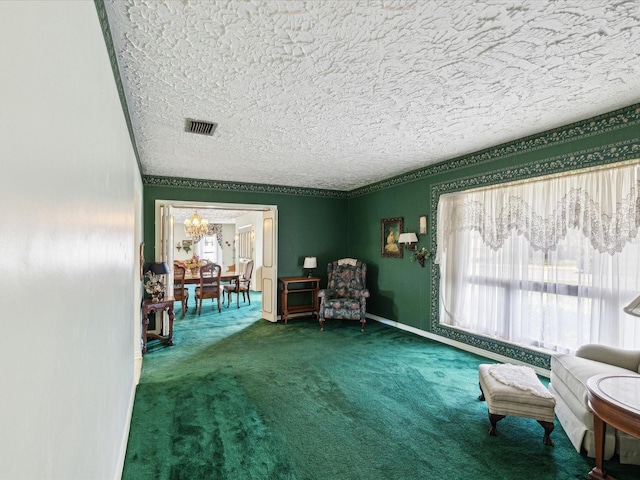6823 Oak Hill Dr, New Port Richey, FL 34653 - living area with a chandelier, carpet floors, a textured ceiling, and baseboards