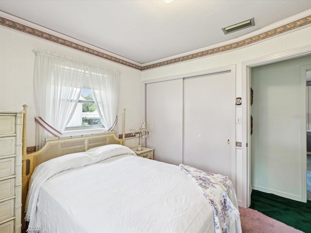 6823 Oak Hill Dr, New Port Richey, FL 34653 - carpeted bedroom with a closet and baseboards