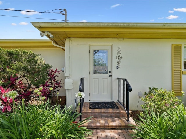 6823 Oak Hill Dr, New Port Richey, FL 34653 - property entrance with stucco siding