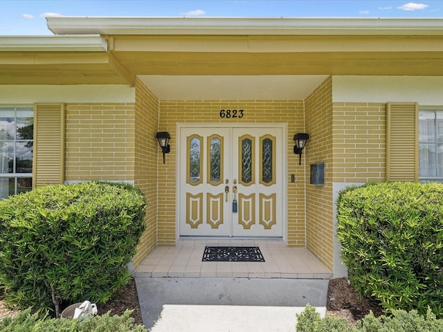 6823 Oak Hill Dr, New Port Richey, FL 34653 - entrance to property featuring brick siding