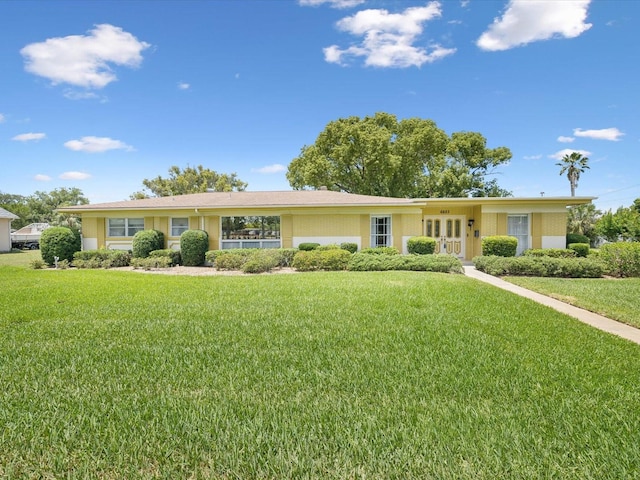 6823 Oak Hill Dr, New Port Richey, FL 34653 - ranch-style house featuring a front lawn