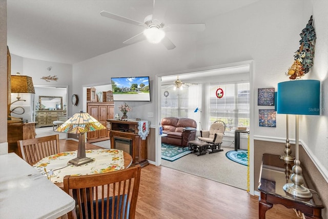 8596 SW 108th Place Rd, Ocala, FL 34481 - dining space featuring a ceiling fan, wood finished floors, and lofted ceiling