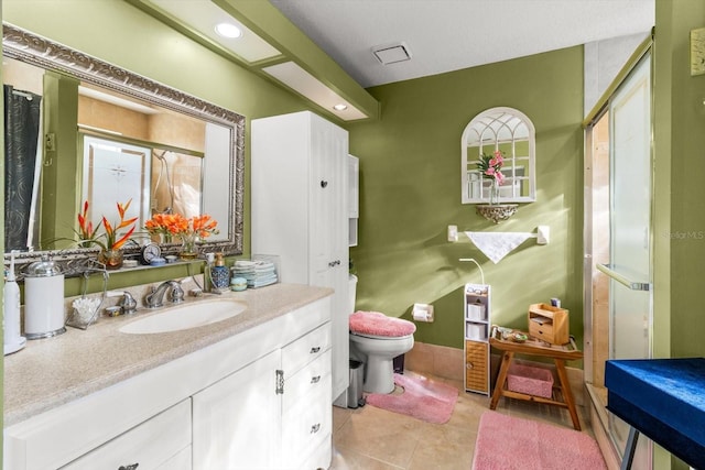 8596 SW 108th Place Rd, Ocala, FL 34481 - bathroom with a stall shower, toilet, vanity, tile patterned flooring, and recessed lighting