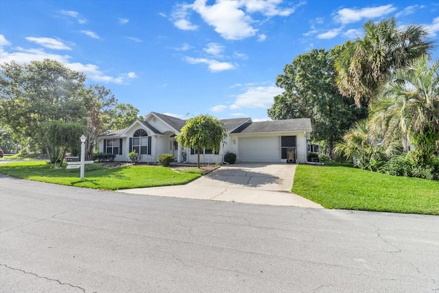 8596 SW 108th Place Rd, Ocala, FL 34481 - ranch-style house featuring concrete driveway, a front yard, and an attached garage