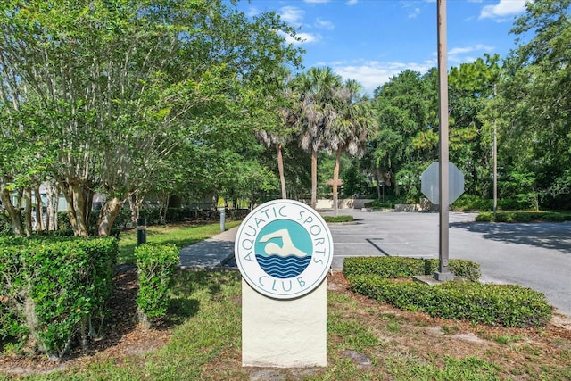 8596 SW 108th Place Rd, Ocala, FL 34481 - community / neighborhood sign with view of wooded area