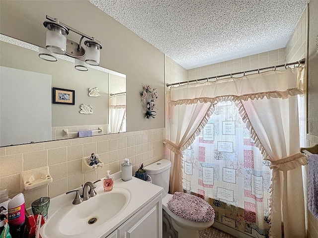 6213 Emerson Dr, New Port Richey, FL 34653 - full bathroom featuring tile walls, a textured ceiling, toilet, vanity, and a shower with curtain