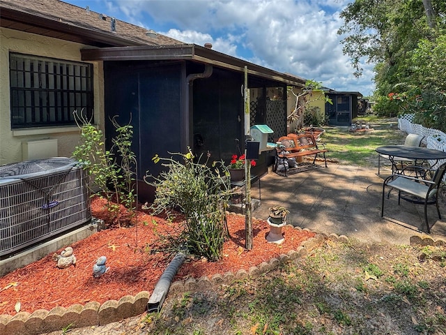 6213 Emerson Dr, New Port Richey, FL 34653 - view of patio with central air condition unit