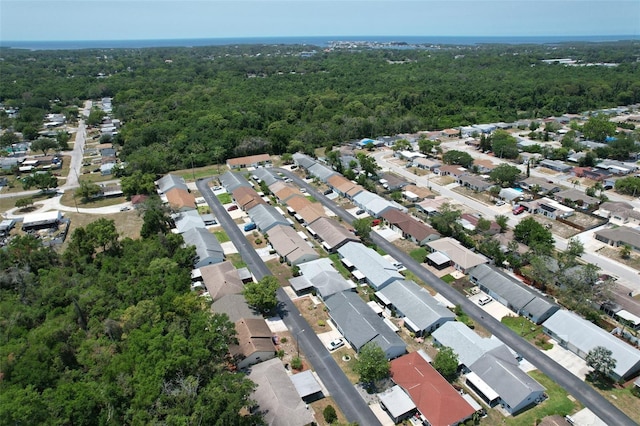 6213 Emerson Dr, New Port Richey, FL 34653 - aerial overview of property's location with a heavily wooded area and nearby suburban area