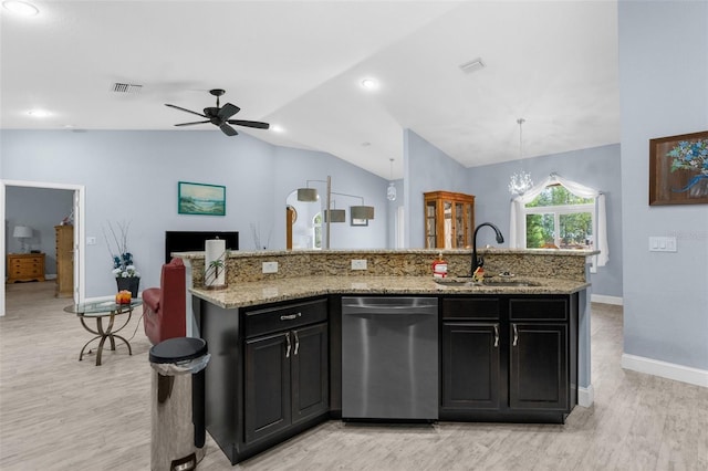 kitchen with dishwasher, a sink, lofted ceiling, light wood-style floors, and dark cabinets