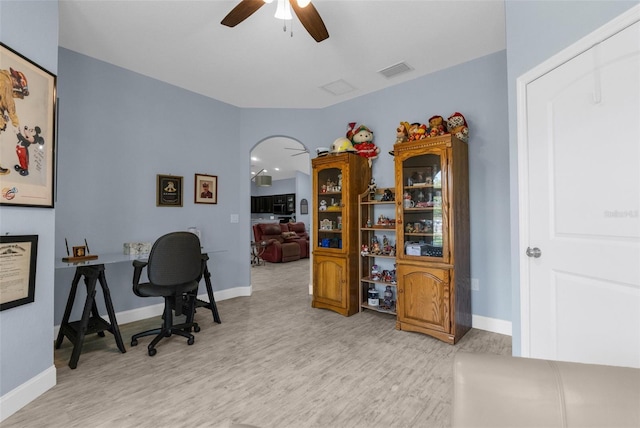 office with ceiling fan, wood finished floors, and baseboards