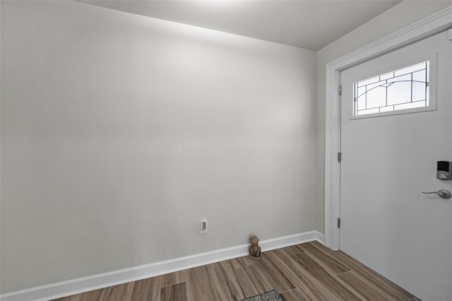 1620 Sea Breeze Dr, Tarpon Springs, FL 34689 - entrance foyer with wood finished floors and baseboards