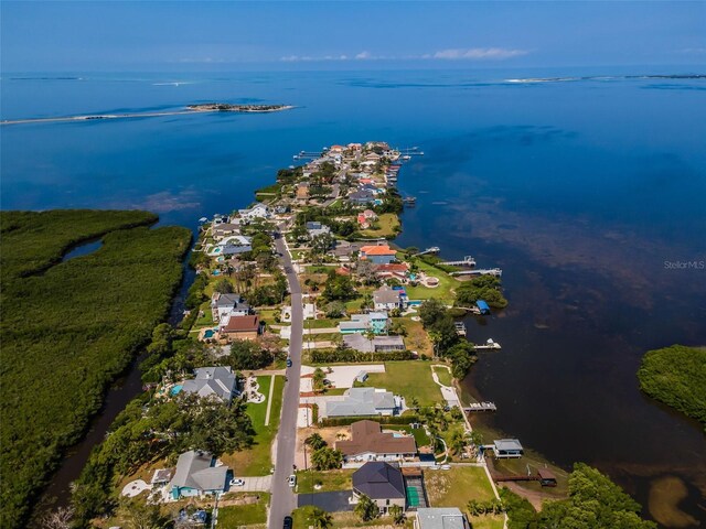 1620 Sea Breeze Dr, Tarpon Springs, FL 34689 - aerial view of property and surrounding area featuring a nearby body of water and nearby suburban area