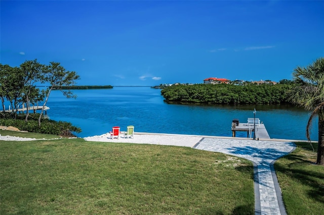 1620 Sea Breeze Dr, Tarpon Springs, FL 34689 - dock area with a lawn and a water view