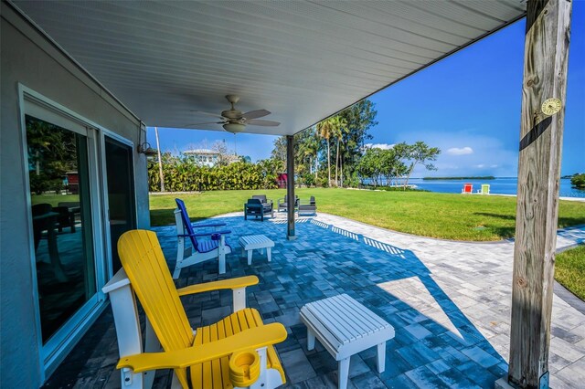 1620 Sea Breeze Dr, Tarpon Springs, FL 34689 - view of patio / terrace with a water view and ceiling fan