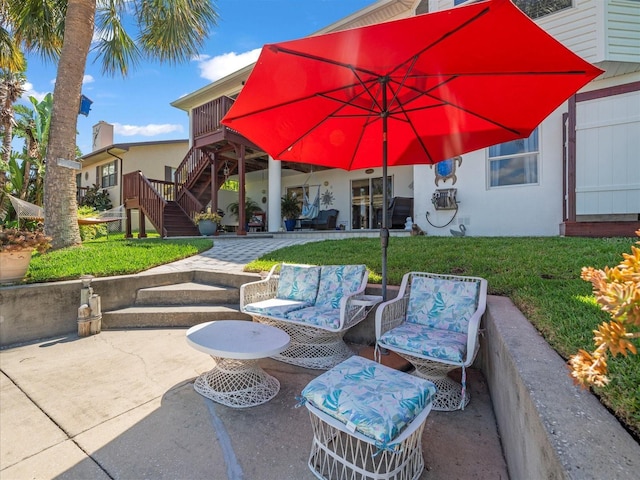 4292 Tahiti Dr, Hernando Beach, FL 34607 - view of patio / terrace featuring stairs and outdoor lounge area