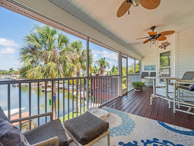 4292 Tahiti Dr, Hernando Beach, FL 34607 - sunroom featuring ceiling fan, a water view, and lofted ceiling