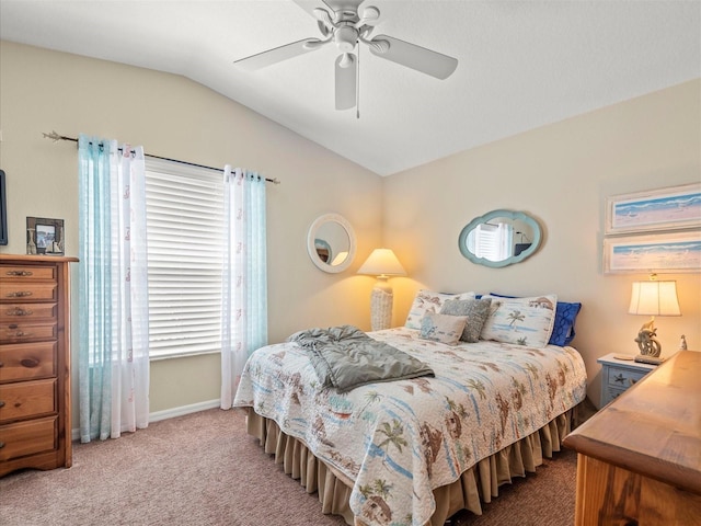 4292 Tahiti Dr, Hernando Beach, FL 34607 - carpeted bedroom with vaulted ceiling, baseboards, and ceiling fan