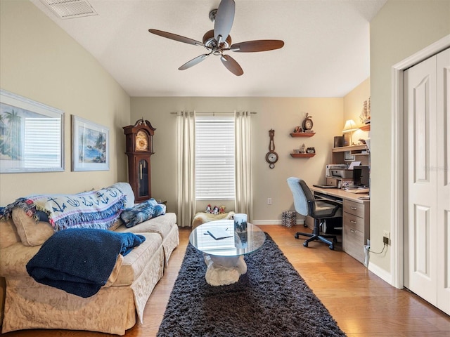 4292 Tahiti Dr, Hernando Beach, FL 34607 - living area featuring a ceiling fan, light wood-type flooring, a desk, and baseboards
